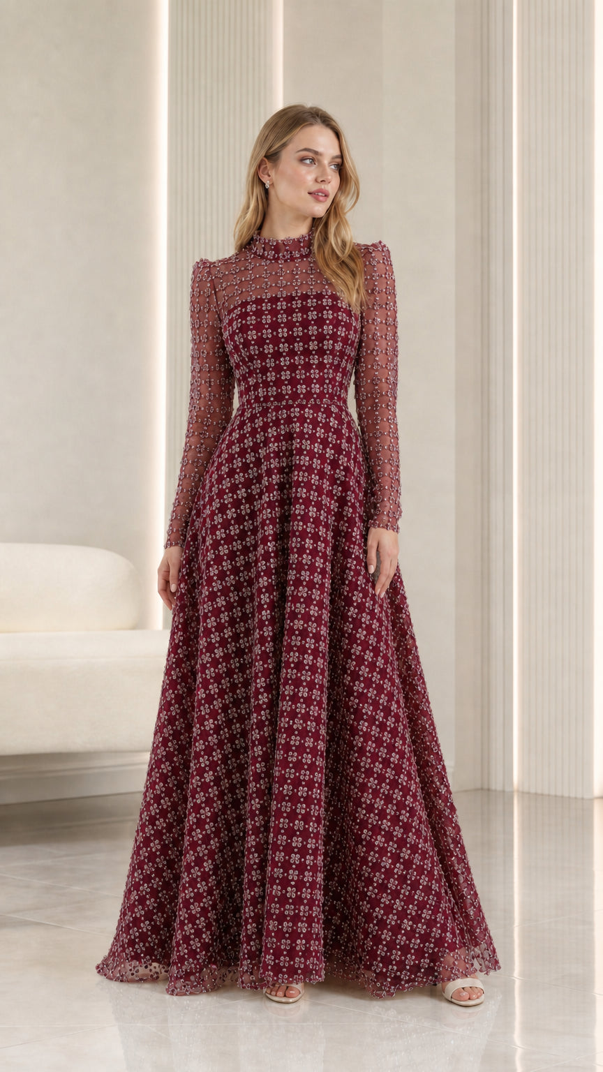 Full-length front view of burgundy wine embellished illusion high-neck maxi evening gown