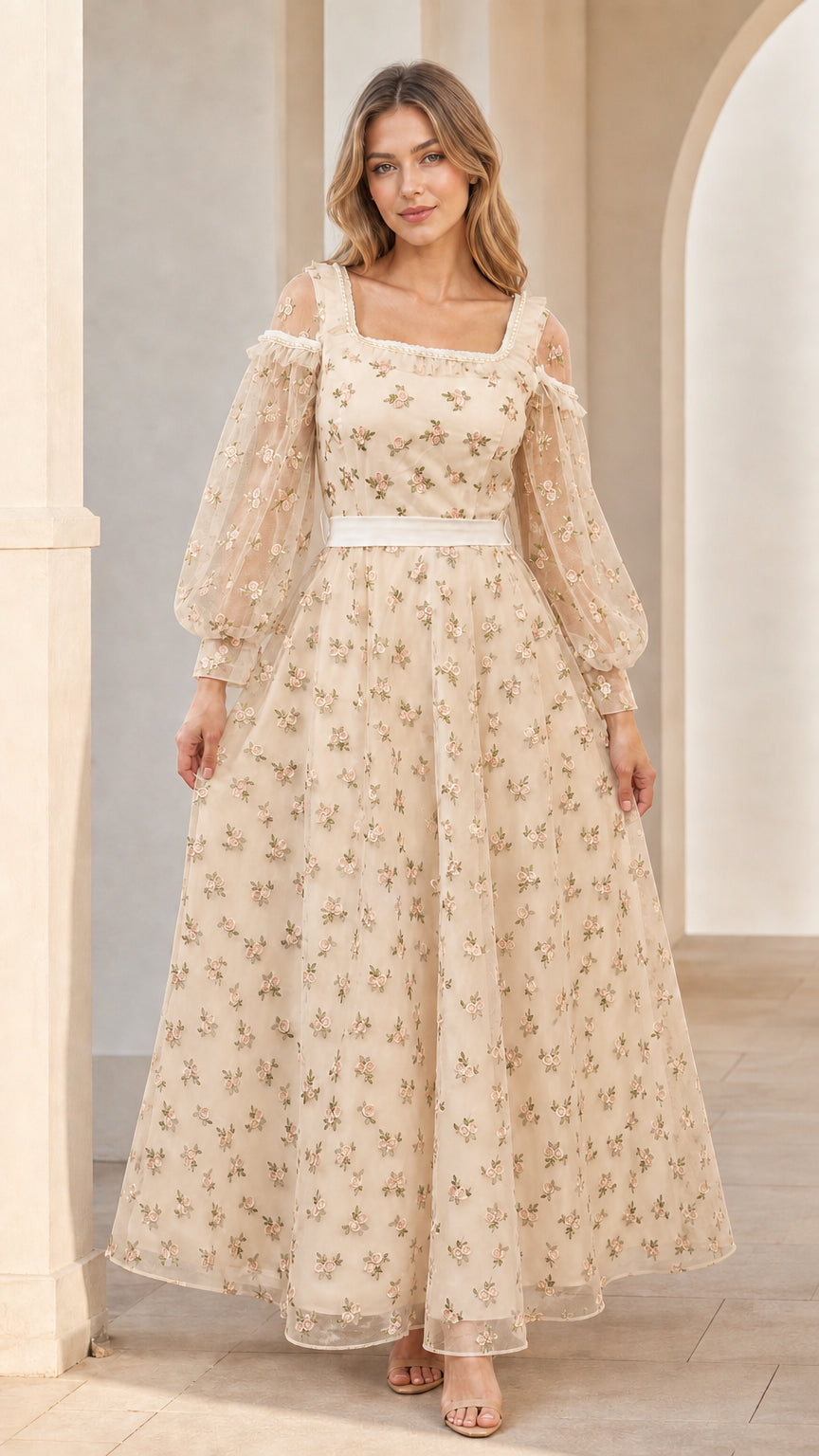 Model wearing champagne beige floral embroidered maxi dress