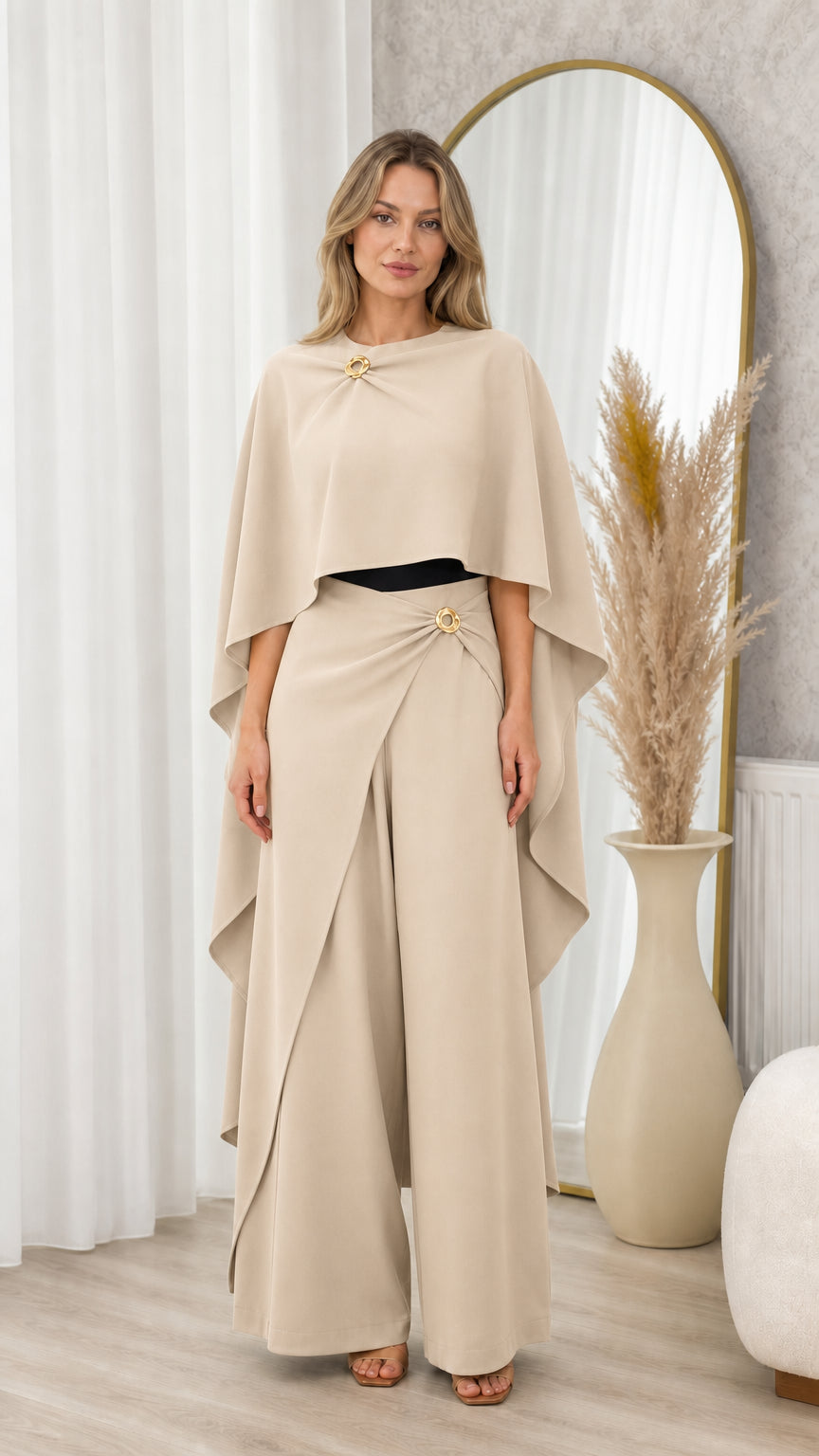 Full front view of beige champagne draped cape top and wide-leg trousers set