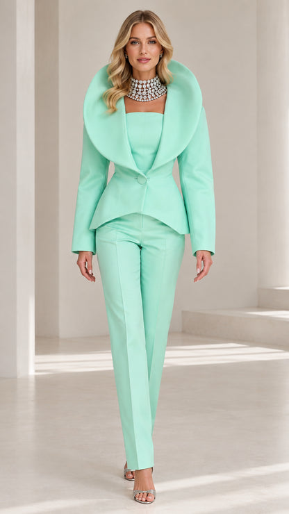 Front view of model wearing Mint Green sculpted shawl collar suit set with necklace and heels