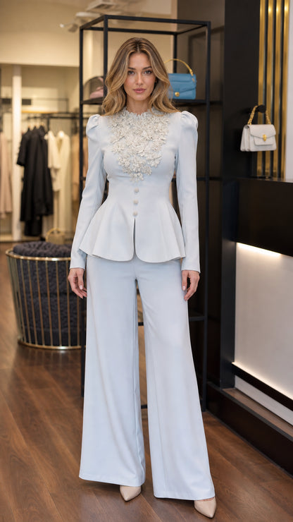 Light blue two-piece peplum pantsuit with floral lace embellished neckline front view