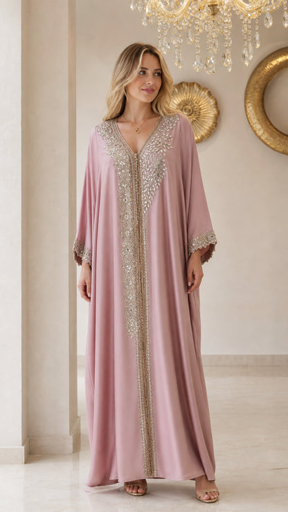 Front view of model wearing dusty pink embellished V-neck kaftan maxi dress