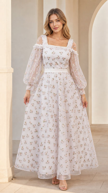 Front view of model wearing white floral embroidered square neck maxi dress with cold-shoulder puff sleeves