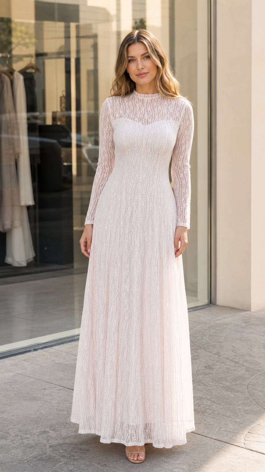 Model wearing an Ivory White lace long sleeve mock neck illusion maxi dress front view