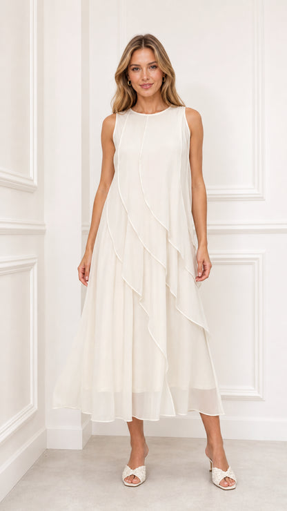 Front view of model wearing ivory sleeveless tiered chiffon midi dress