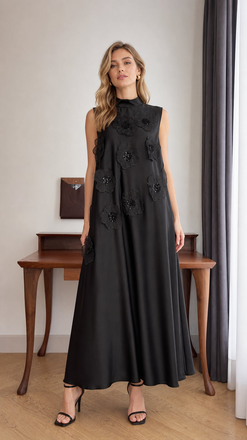 Model wearing Black 3D floral applique high neck sleeveless maxi dress front view