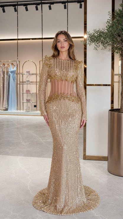 Full front view of Champagne Gold long sleeve sequin gown with sheer corset waist