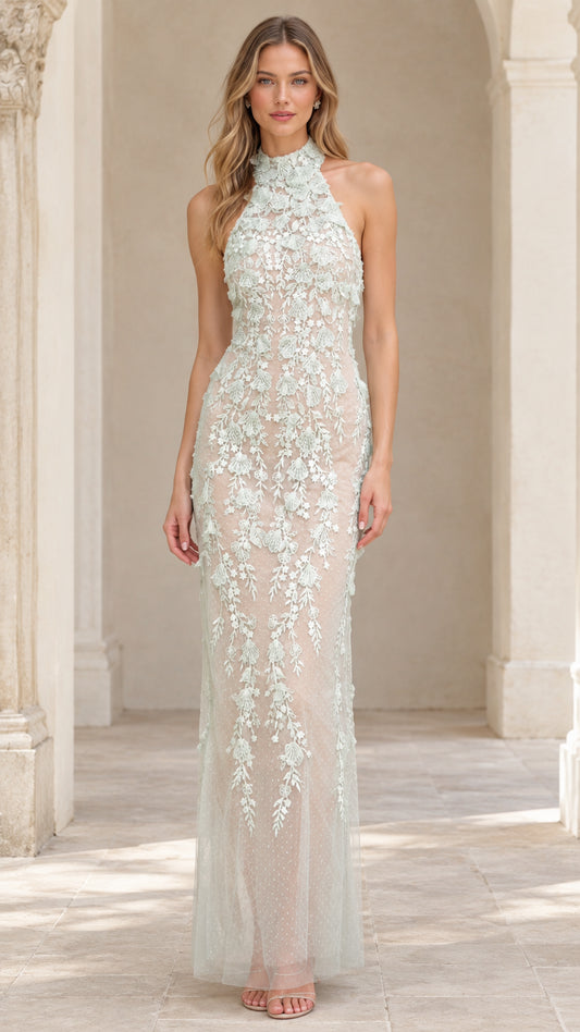 Front view of model wearing Sage Green 3D floral applique halter neck maxi evening gown