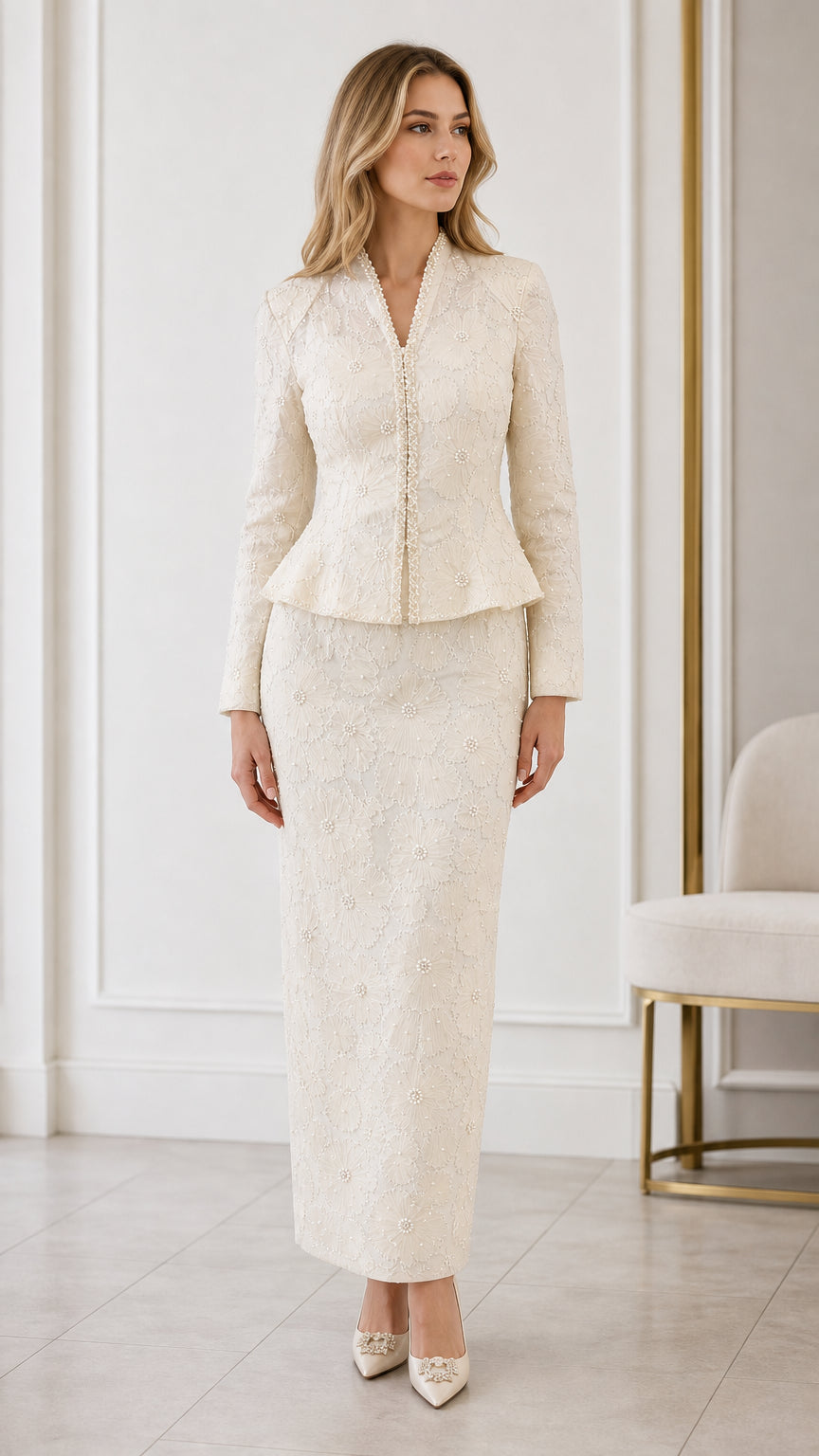 Full front view of cream embroidered peplum jacket and maxi skirt suit