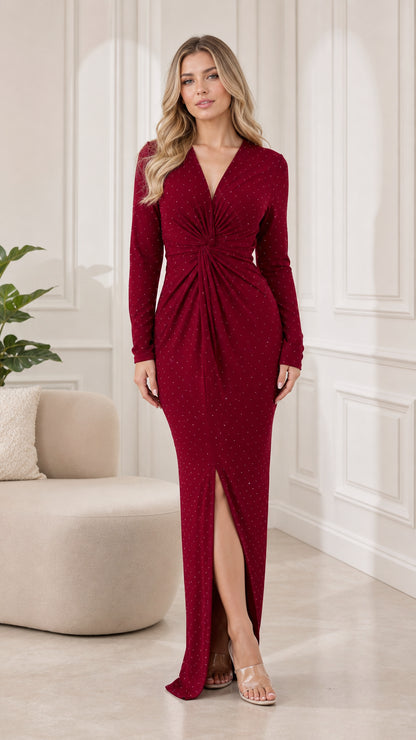 Model wearing Burgundy long sleeve V-neck sparkle maxi dress with twist front detail and slit