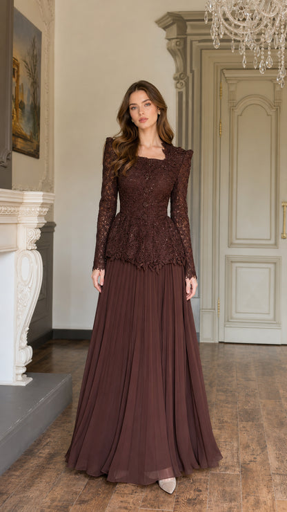 Model wearing Chocolate Brown long sleeve lace peplum maxi dress with pleated skirt front view