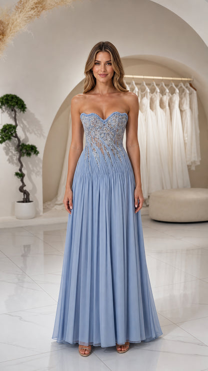 Front view of woman wearing Light Blue strapless beaded corset pleated maxi evening gown