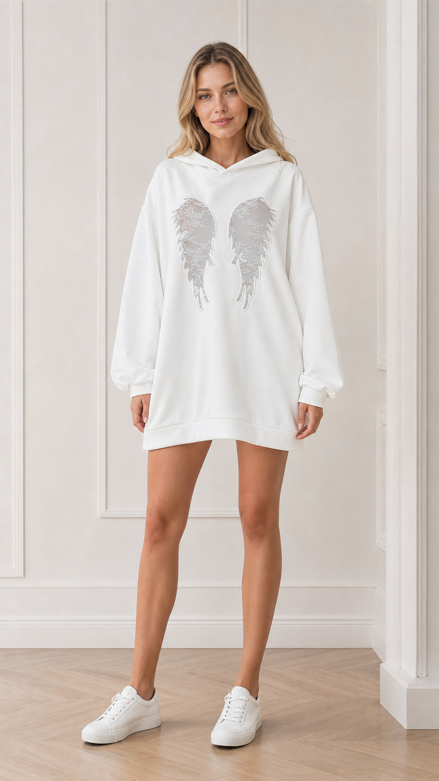 Front view of model wearing the white oversized angel wings hoodie dress