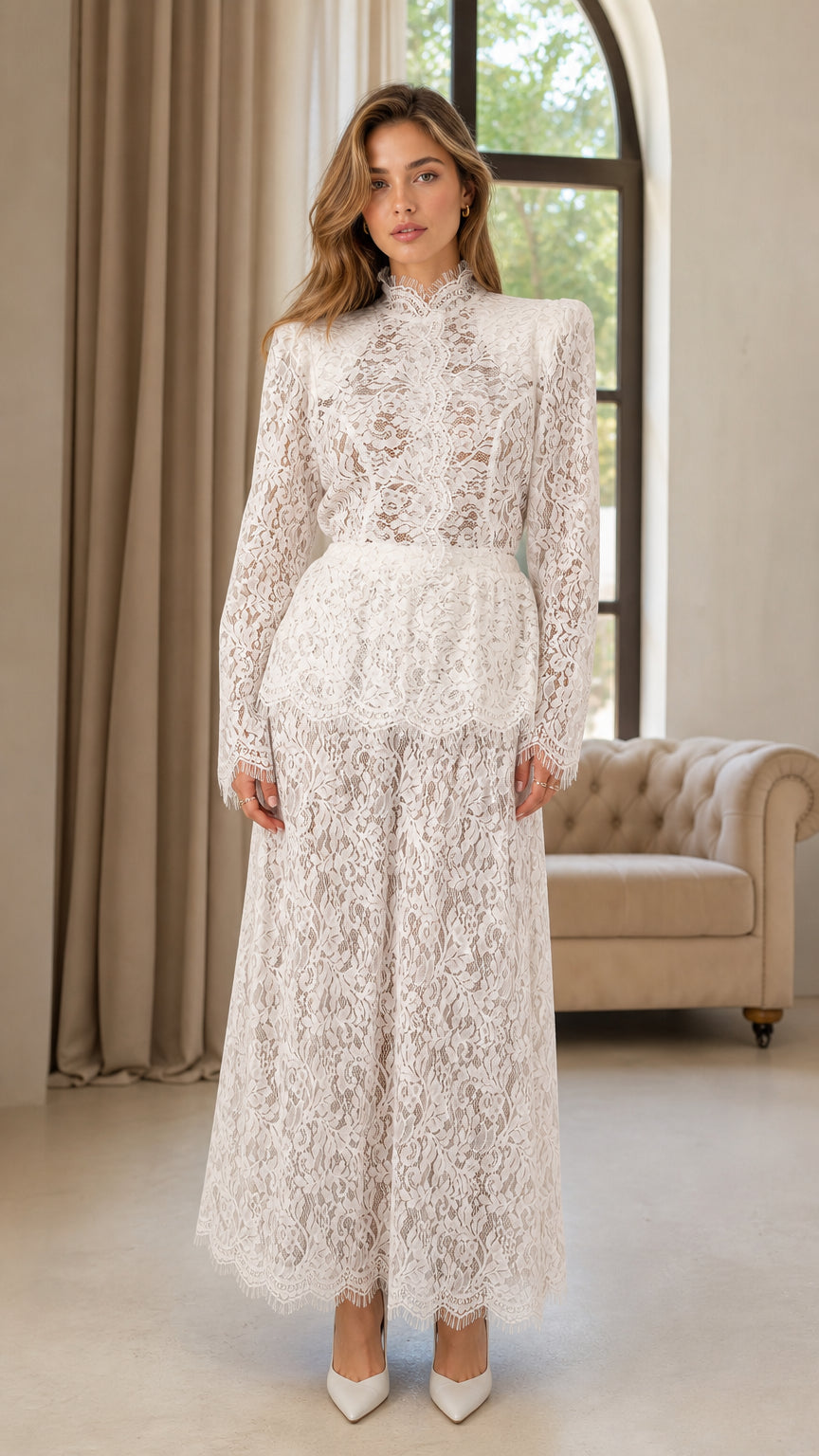 Front full view of woman wearing white floral lace mock neck wide leg jumpsuit with peplum