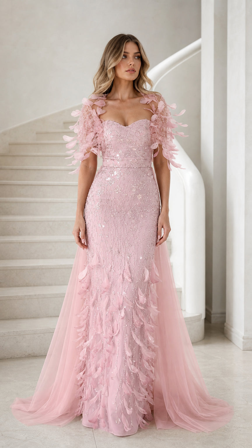 Blush pink sequin and feather embellished evening gown front view with tulle overskirt