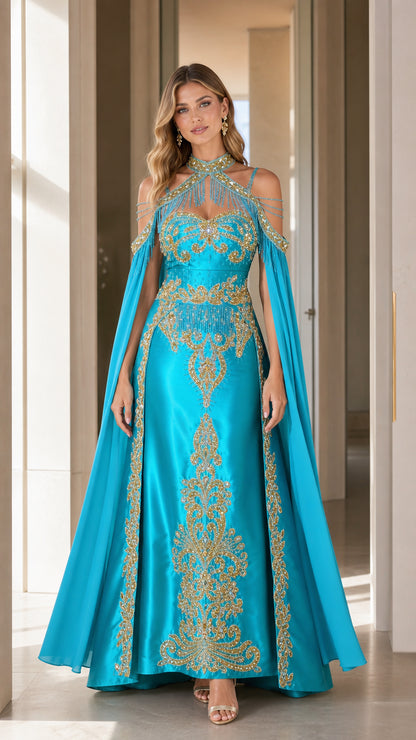 Front view of aqua blue satin evening gown with gold embroidery and flowing cape sleeves