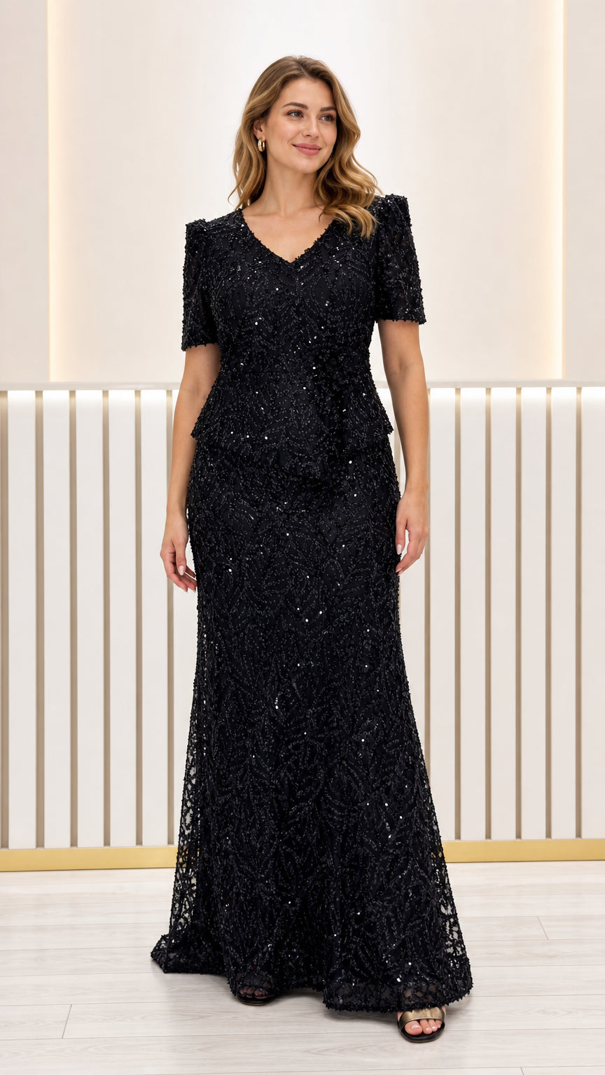 Front view of black sequined embroidered peplum formal evening gown