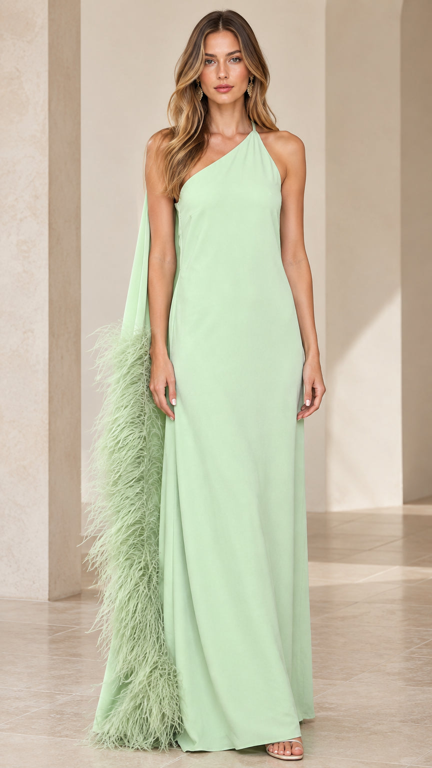 Front view of woman wearing mint green one-shoulder maxi dress with feather cape