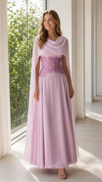 Front view of woman wearing lilac chiffon cape sleeve evening dress with embroidered waist