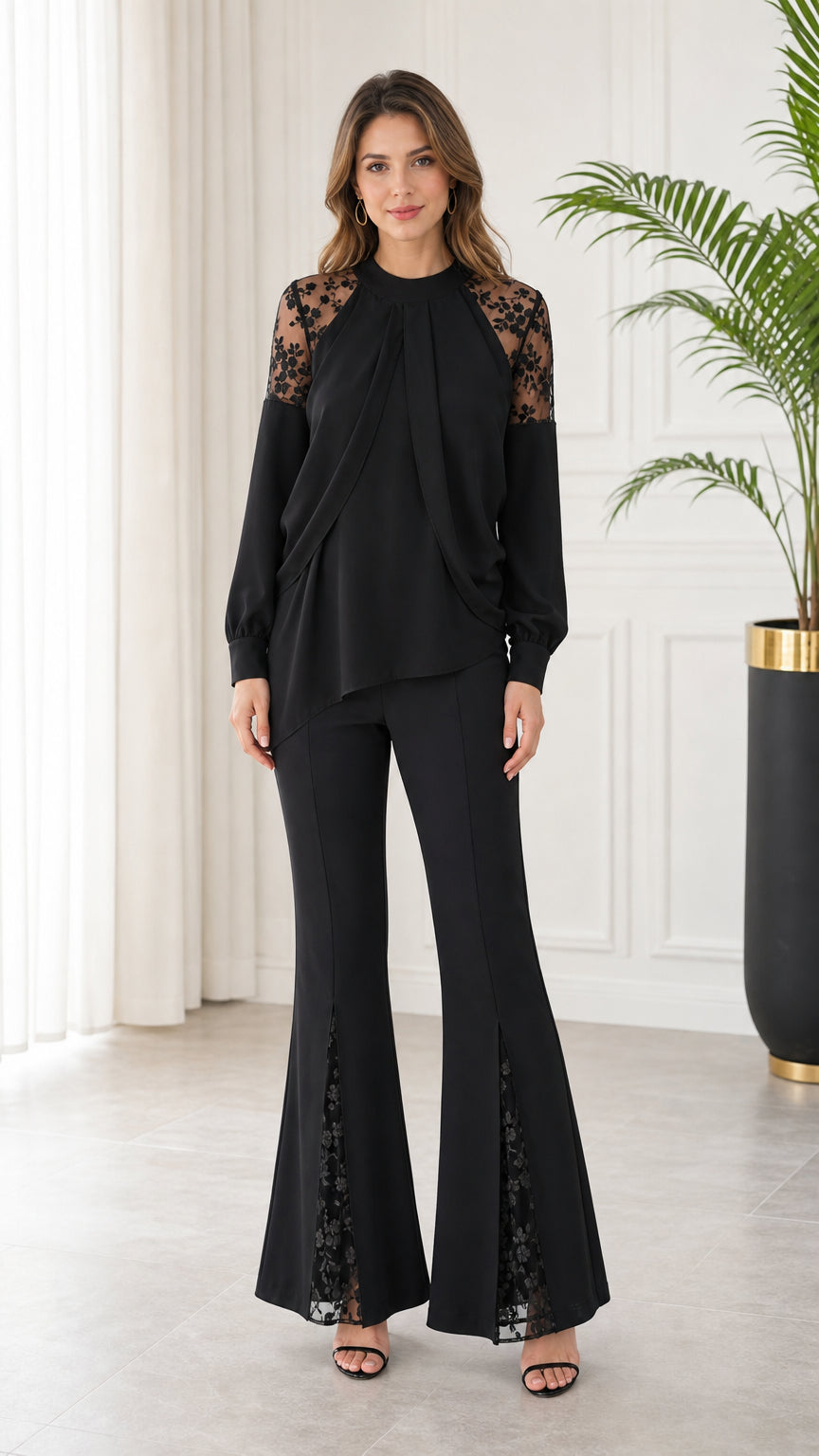 Front full-length view of model wearing black long sleeve lace patchwork top and matching flare pants set