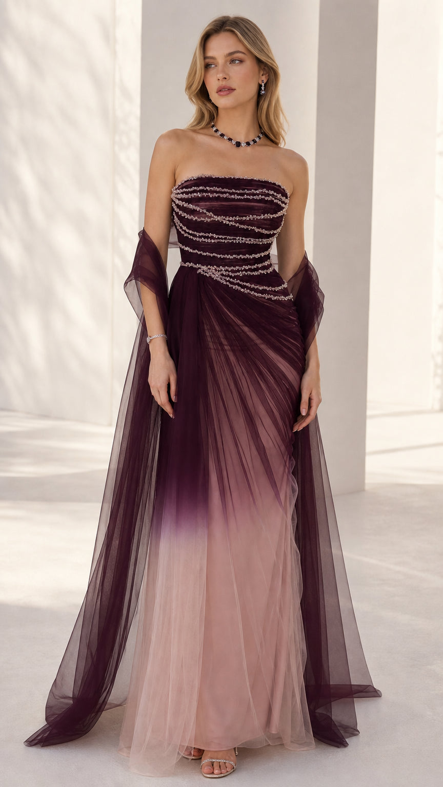 Full-length front view of the strapless beaded bodice evening gown in burgundy ombre tulle with matching wrap