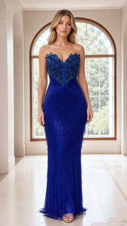 Front view of model wearing royal blue strapless beaded fringe evening gown