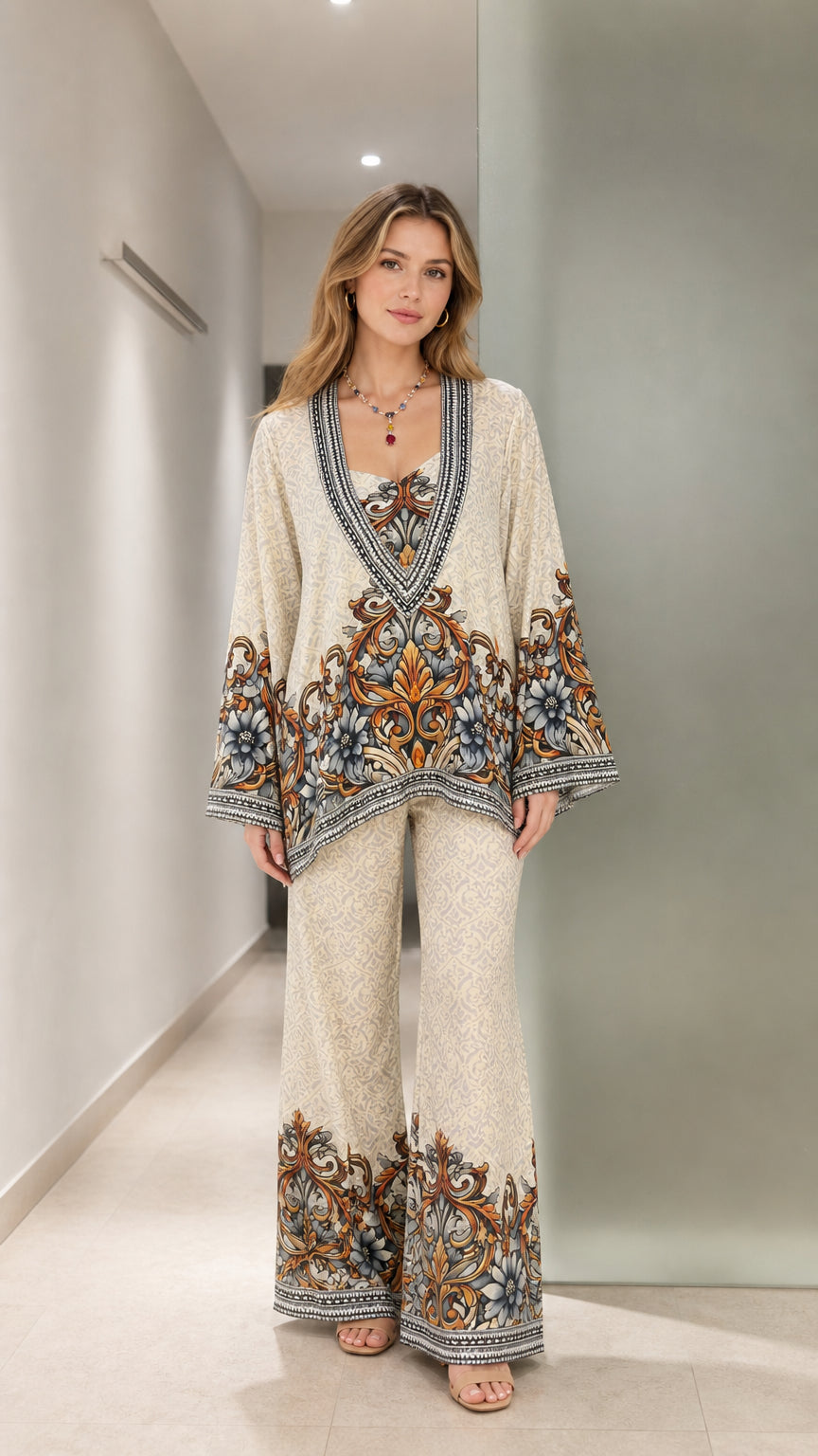 Front full-length view of model wearing cream vintage baroque floral tunic and wide leg pants set