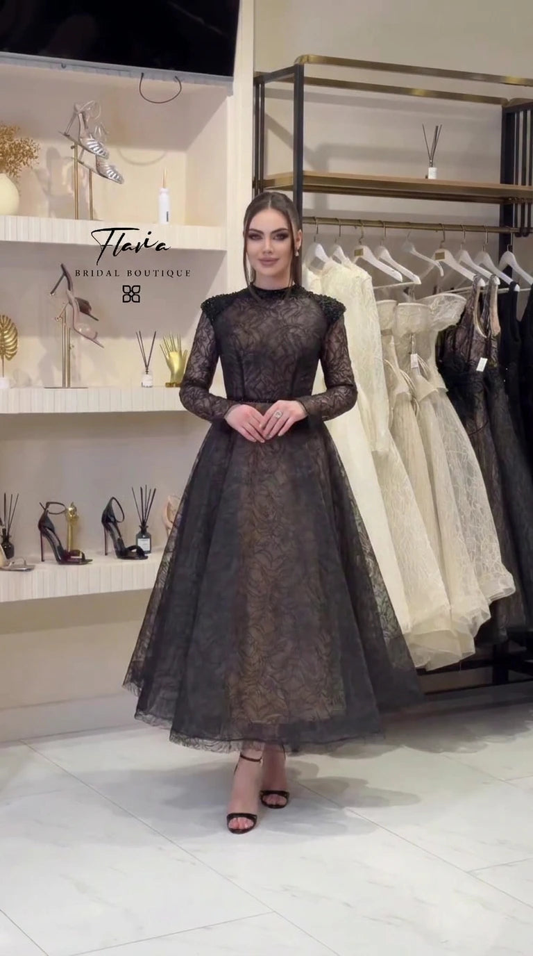 Black long sleeve lace tea length evening dress front view