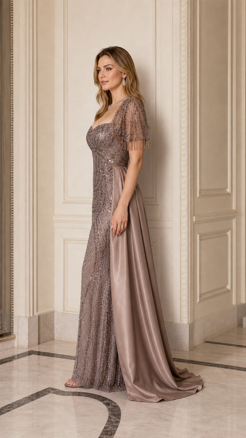 Taupe beaded formal dress with dramatic satin side train side profile