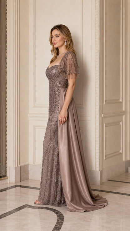 Taupe beaded formal dress with dramatic satin side train side profile