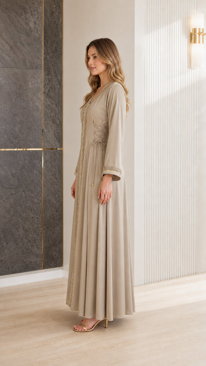 Beige long sleeve embroidered abaya dress side profile view