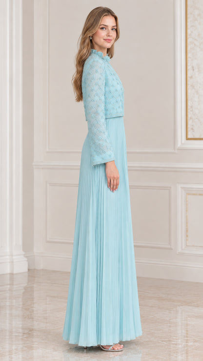Side profile view of sky blue pleated formal gown and long sleeve embroidered jacket