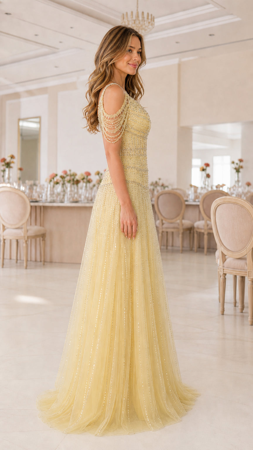 Side profile view of model in pastel yellow sequin tulle formal maxi dress
