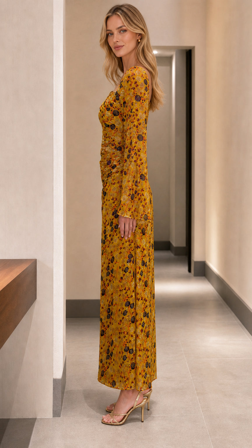 Mustard yellow floral bodycon maxi dress side view showing silhouette