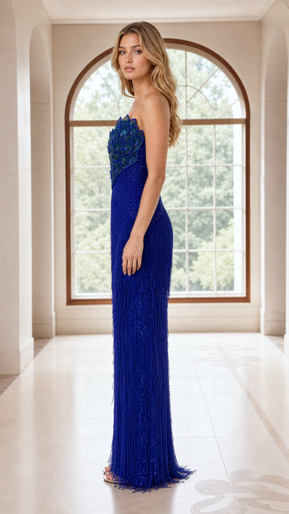 Side view of royal blue strapless floor-length beaded evening gown