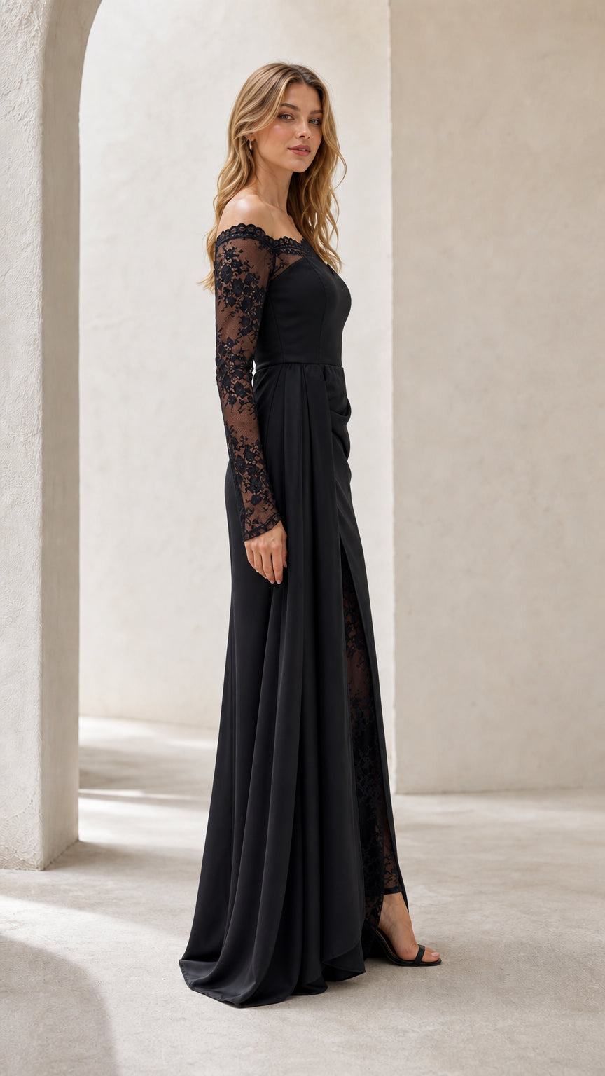 Side profile of elegant black lace off-the-shoulder formal maxi gown