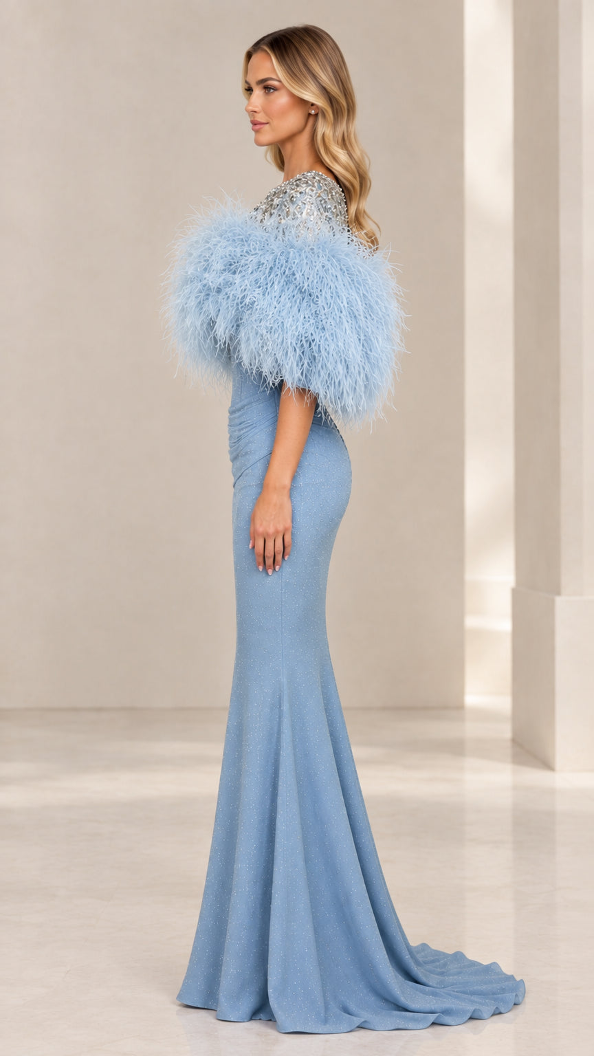 Side profile view of sky blue feather trimmed formal evening gown