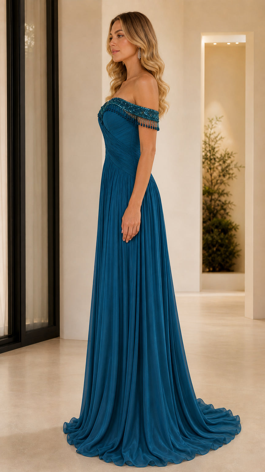 Side profile of woman wearing teal blue off-the-shoulder formal maxi gown