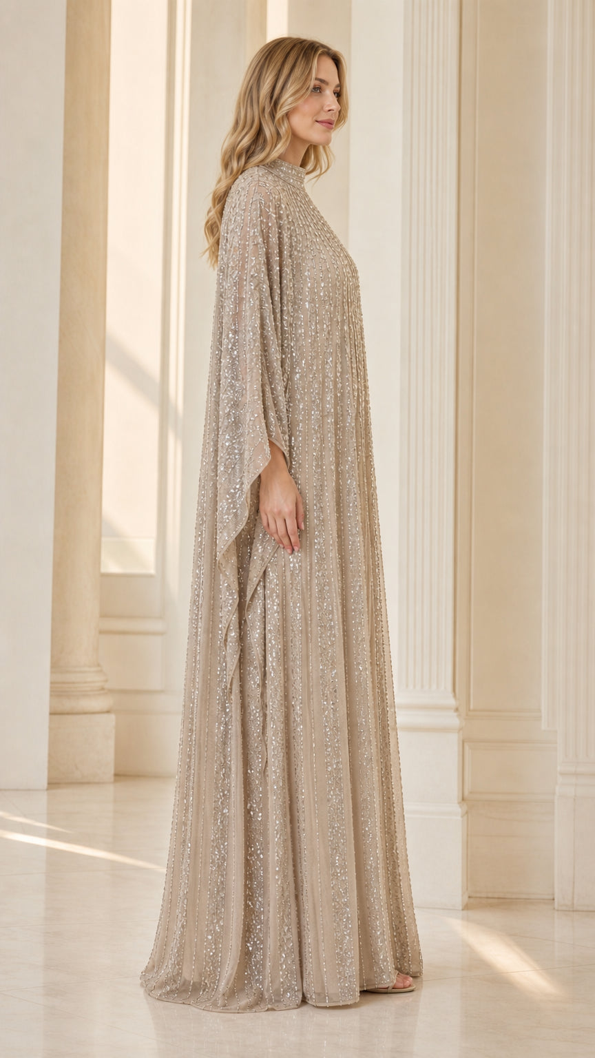 Champagne pleated sequin kaftan evening dress side profile with cape sleeves