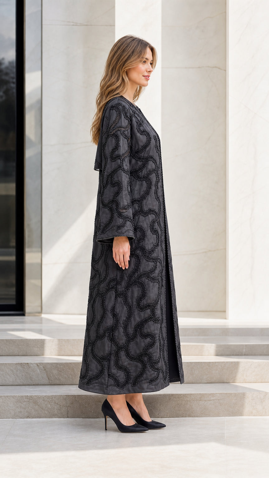 Model wearing Black embellished kimono duster side view