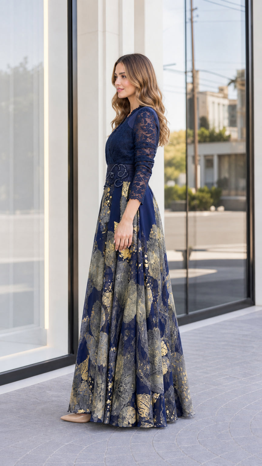 Side view of woman wearing navy blue and gold metallic formal maxi dress