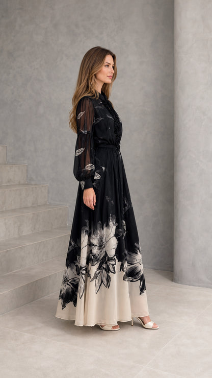 Side profile of woman wearing black floral chiffon evening gown