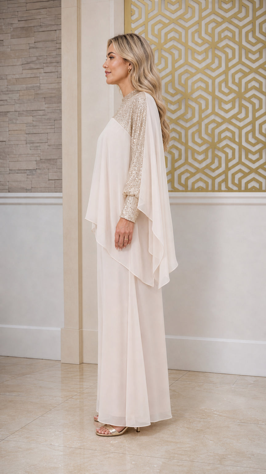 Side profile view of champagne two-piece formal pant suit with sequin sleeves