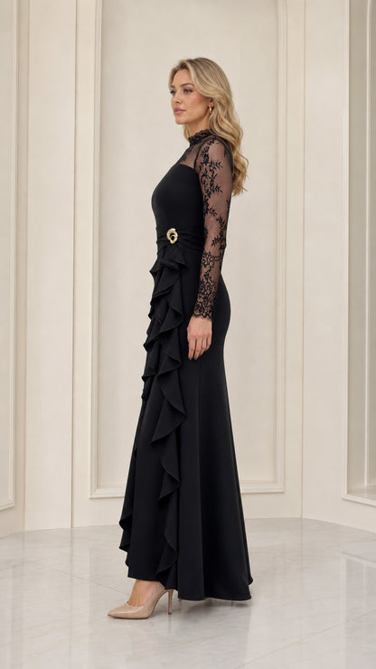 Side angle of black formal evening dress with long lace sleeves and ruffled slit