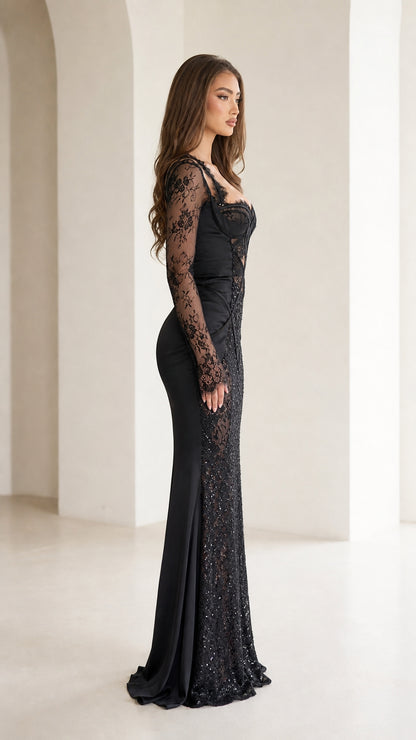 Side profile view of black long sleeve sequin mermaid formal dress