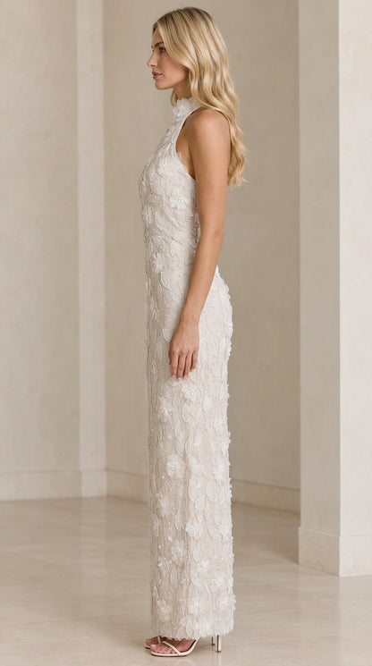 Side view of Ivory halter column formal dress showing tailored fit and floral texture