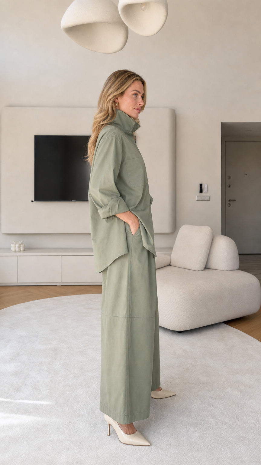 Side profile view of women's matching shirt and wide-leg pants set in Sage Green