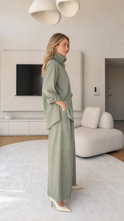 Side profile view of women's matching shirt and wide-leg pants set in Sage Green