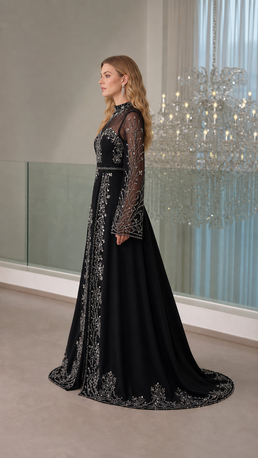 Three-quarter side angle of the black beaded formal gown showing silhouette and train