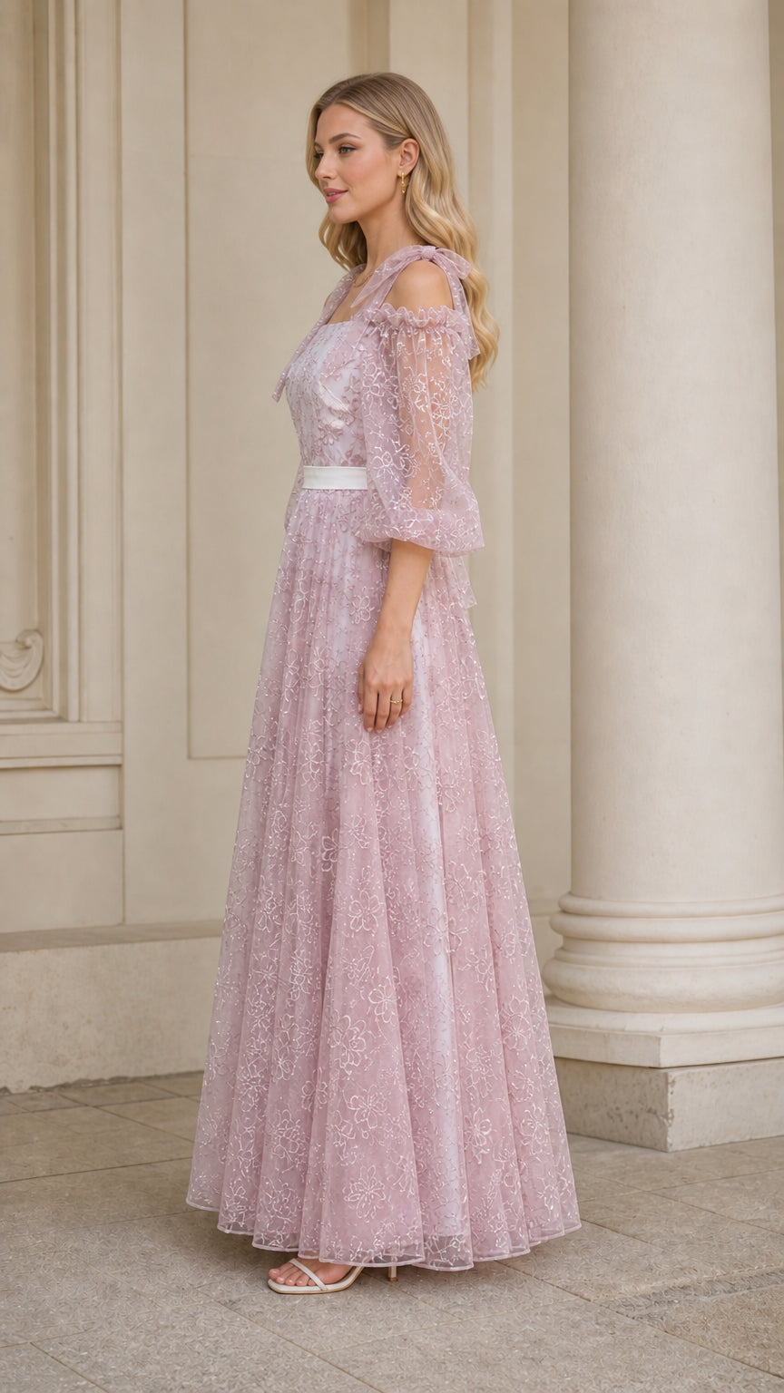 Side profile of dusty pink cold shoulder lace evening gown